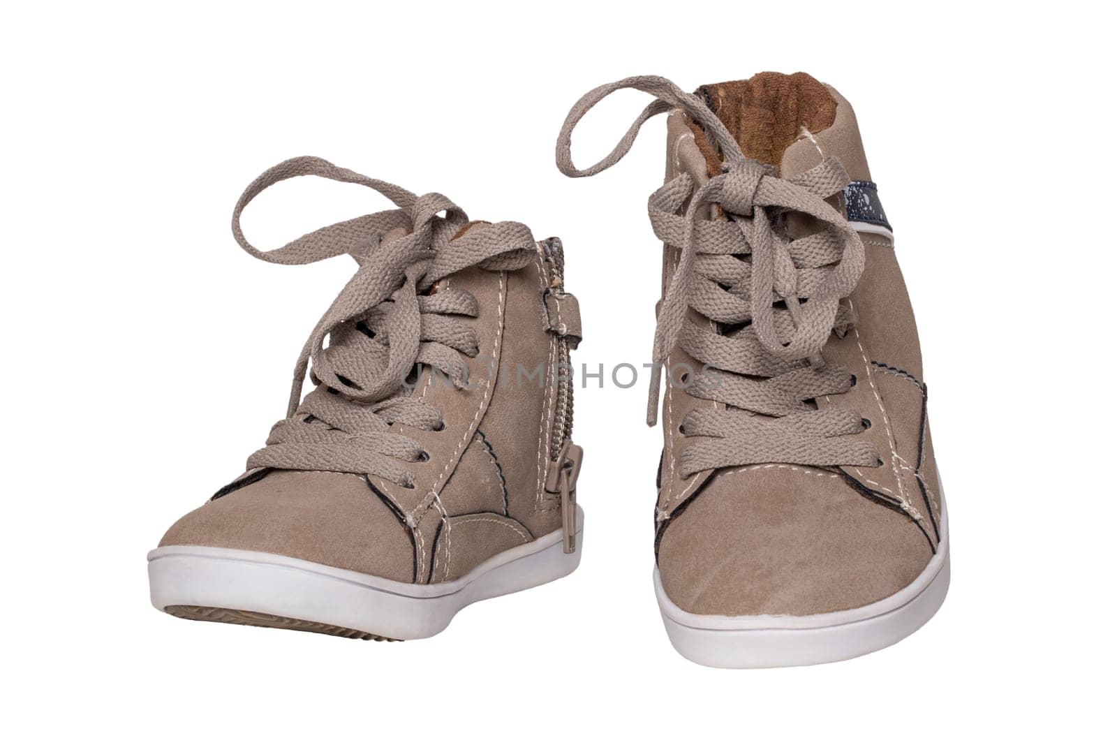 Winter boots and shoes. A pair brown suede winter boots isolated on a white background. Leather shoe fashion new collection winter 2018 to 2019.