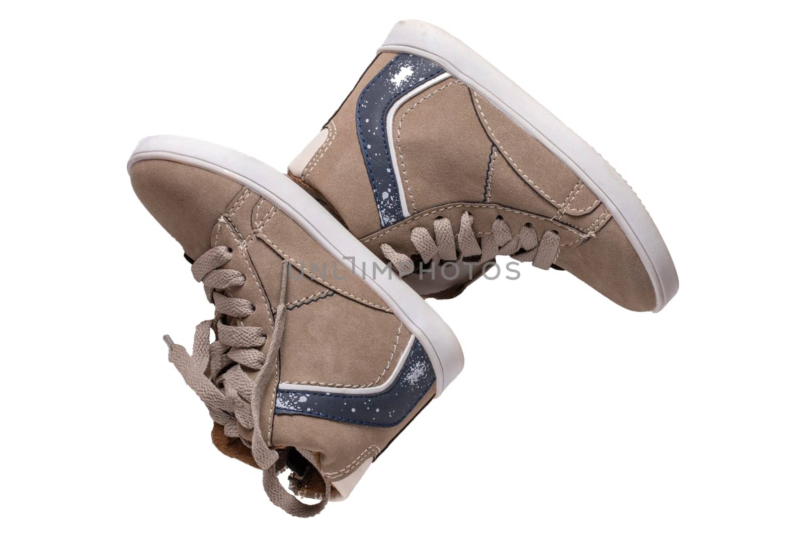 Winter boots and shoes. A pair brown suede winter boots isolated on a white background. Leather shoe fashion new collection winter 2018 to 2019.