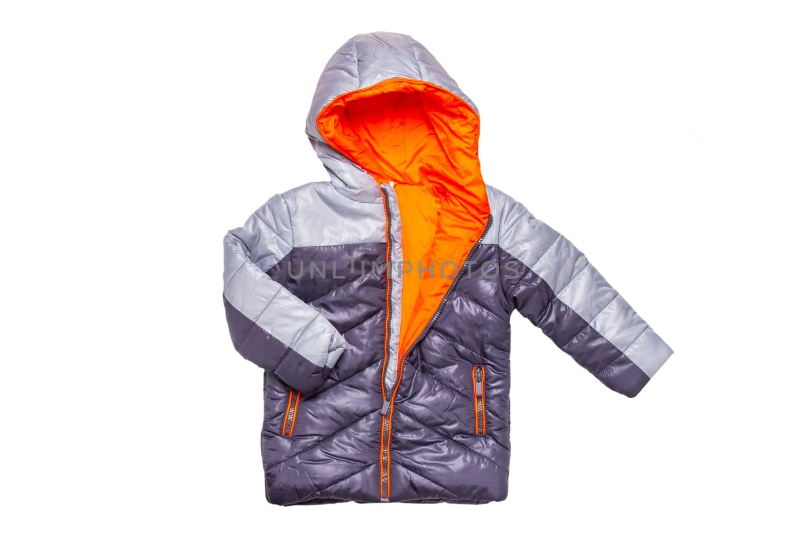 Winter jacket isolated. A stylish black warm down jacket with orange lining for the kids isolated on a white background. Childrens wear for winter.