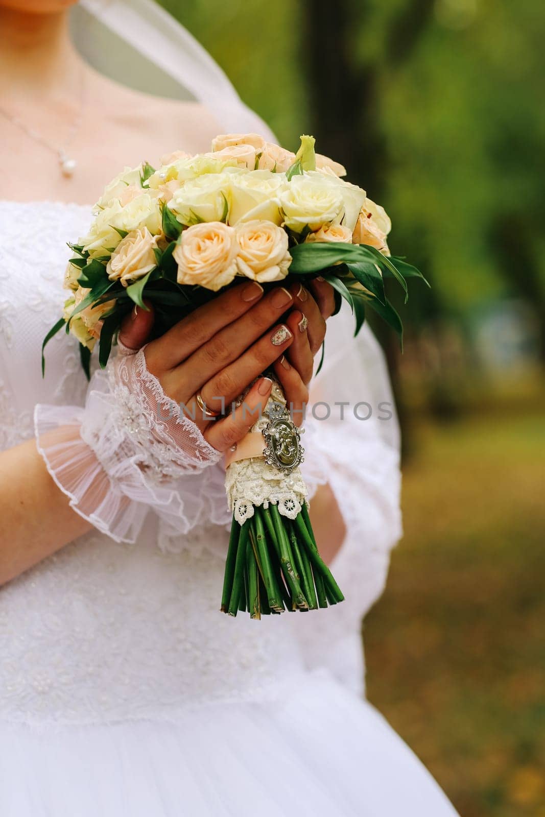 young bride holding a bouquet of flowers
