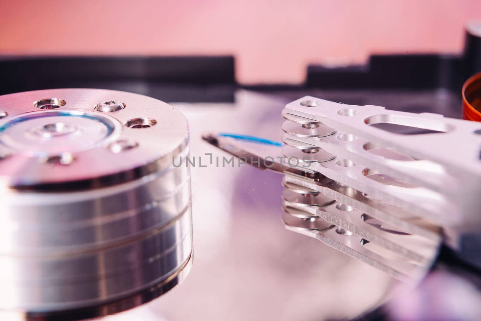 Internal hard disk closeup on wooden background