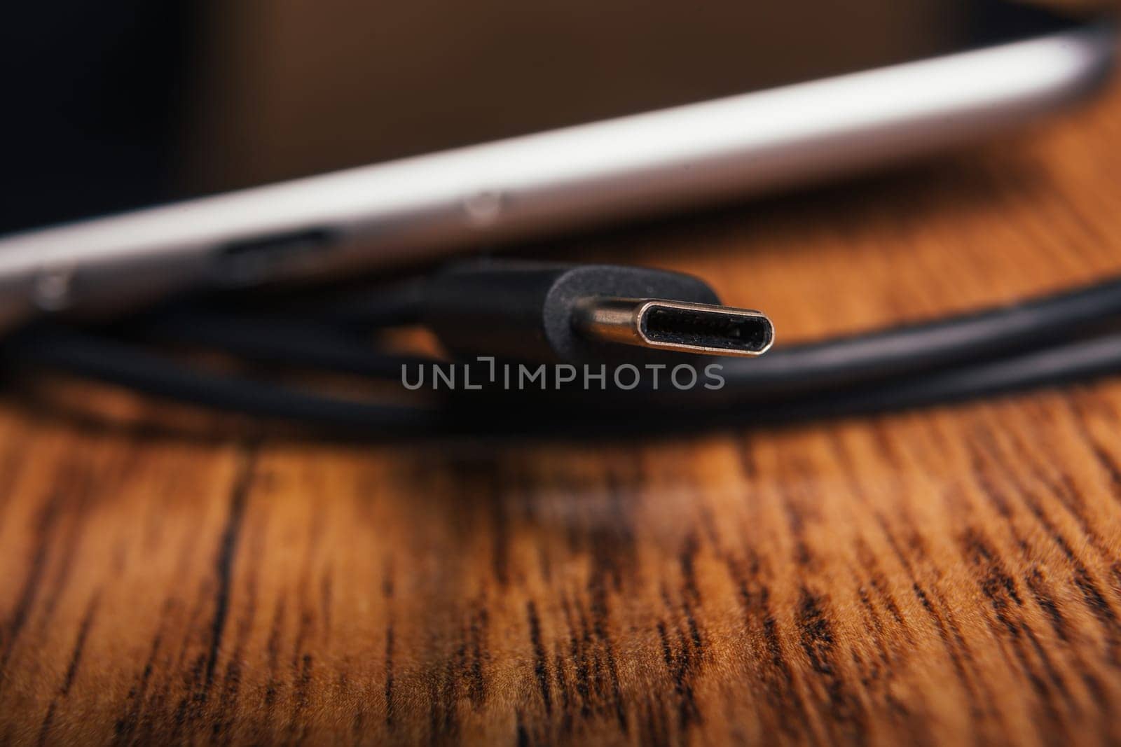 new tablet with built-in usb-c on wooden background