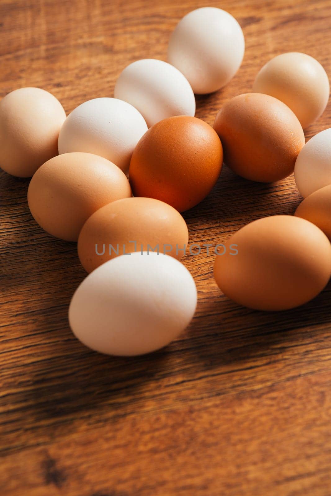 Fresh rural eggs on the wooden background