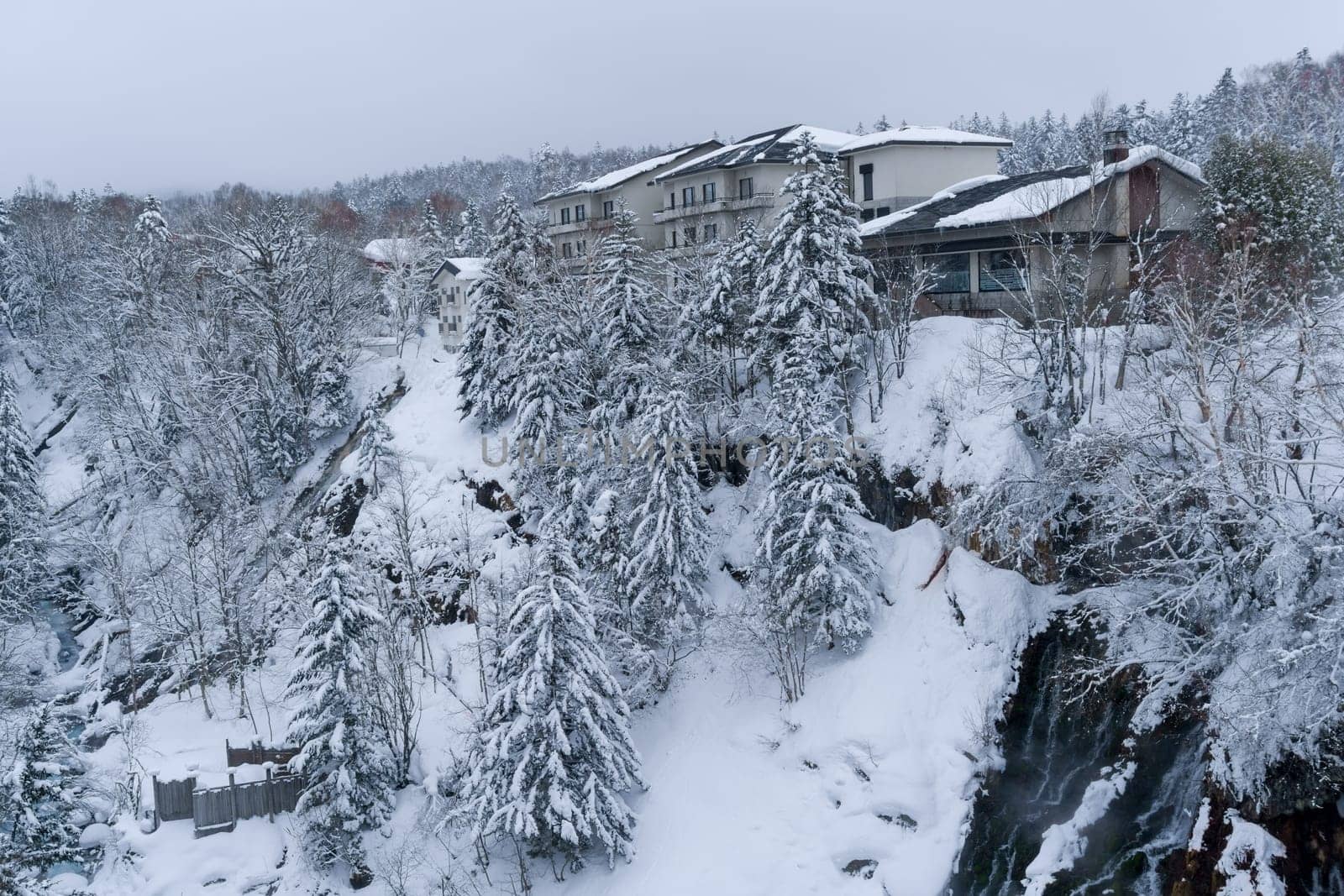 shirahige waterfall located 600 meters above sea leven in the Shirogane hot spring village of Biei City, this waterfall stands more than 30 meters tall. The water flowing down the gaps between the rocks resembles a white beard.