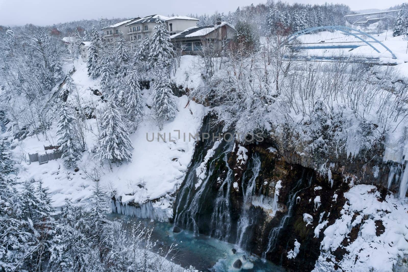 shirahige waterfall located 600 meters above sea leven in the Shirogane hot spring village of Biei City, this waterfall stands more than 30 meters tall. The water flowing down the gaps between the rocks resembles a white beard.