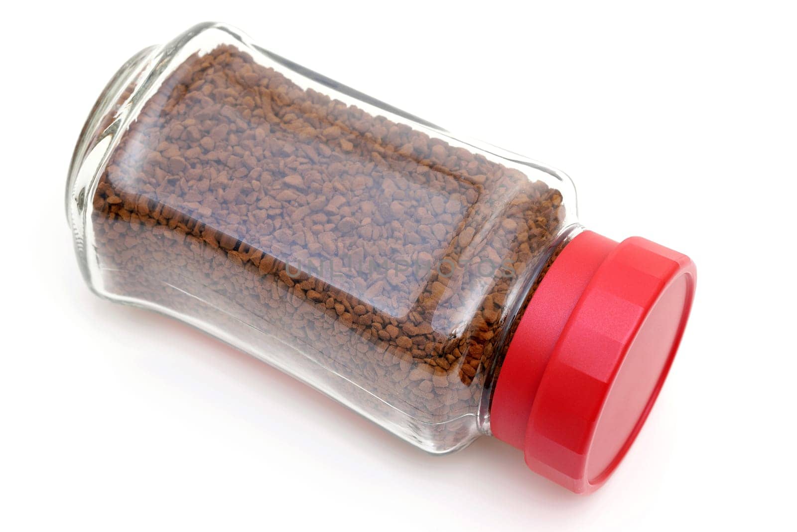 Instant coffee in glass jar isolated on white background