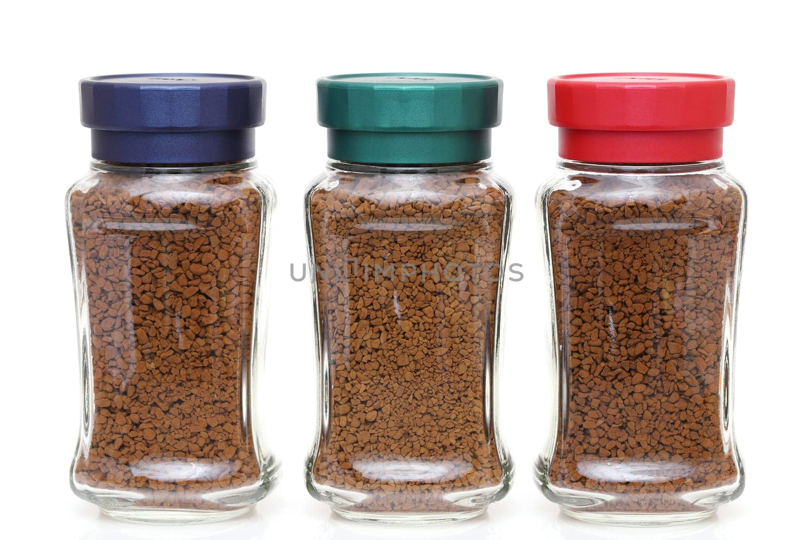 Instant coffee in glass jar isolated on white background