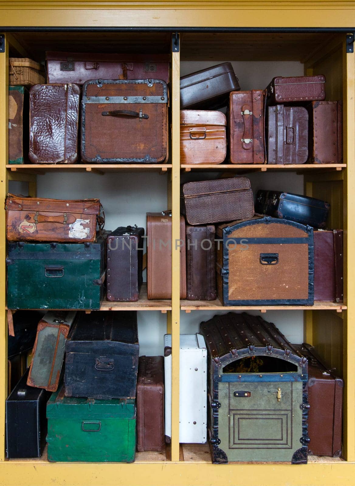 Old suit cases at a train station.