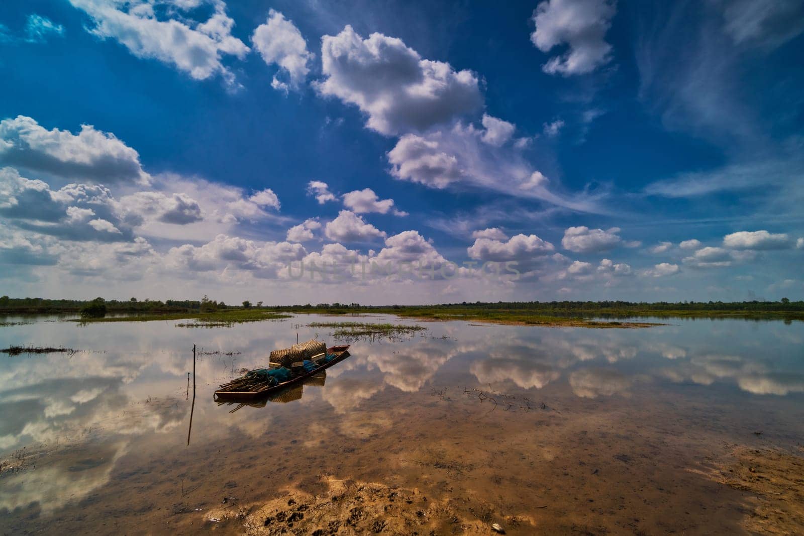 Reflection Lake With Fishing Boat, idyllic landscape with sky and cumulus clouds