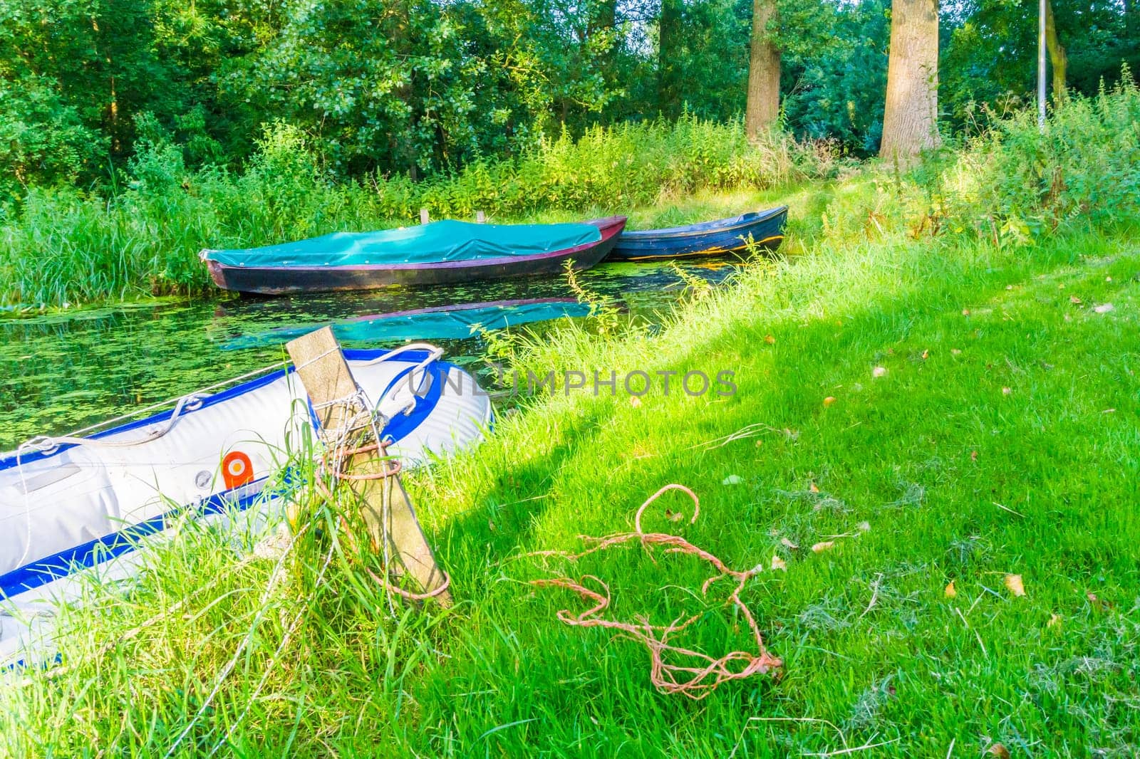 plastic inflatable rescue vessel in the river landscape