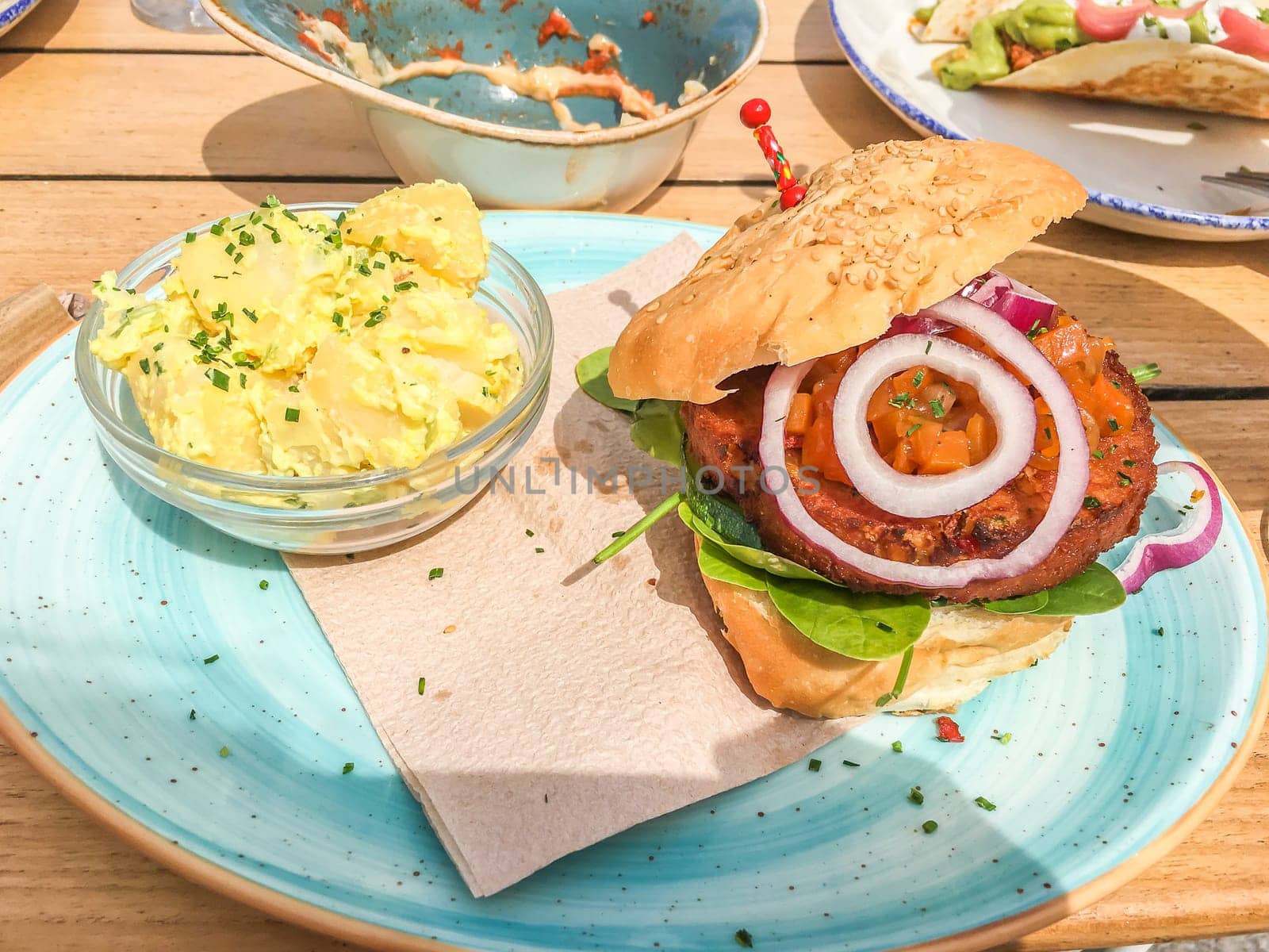 vegetarian lunch vegan burger and potatoes dish