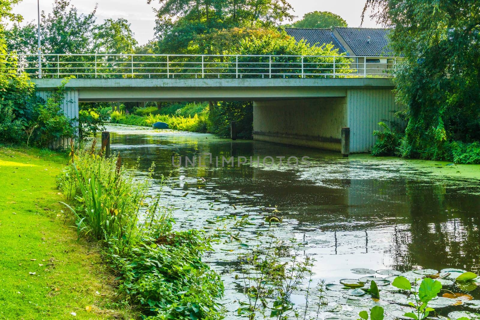 stone bridge to cross over the river in a water landscape