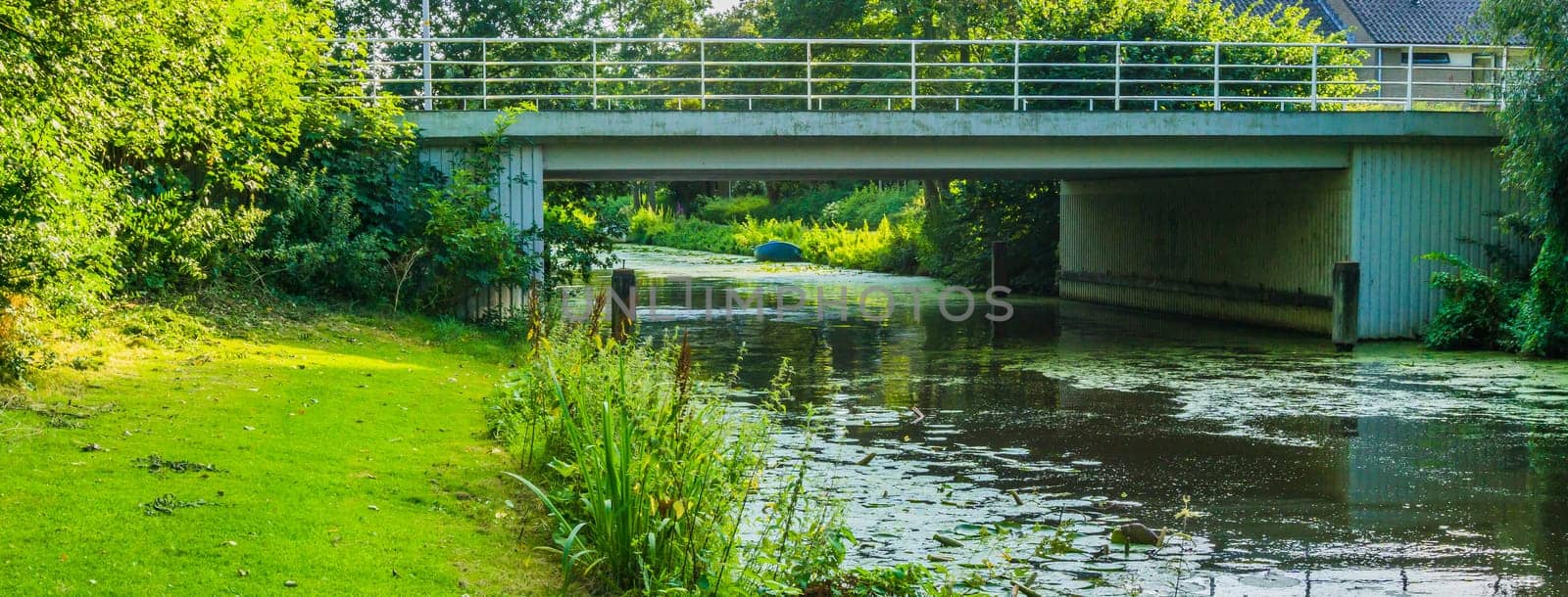 stone water bridge at a river landscape
