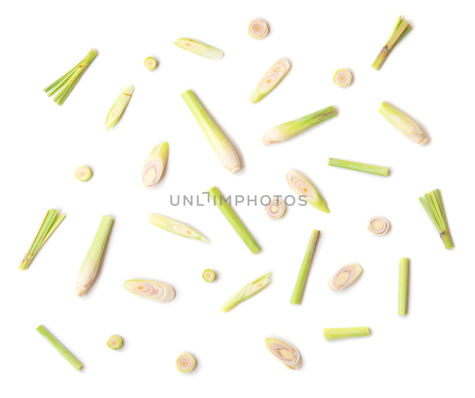Fresh green lemongrass slices isolated on white background.