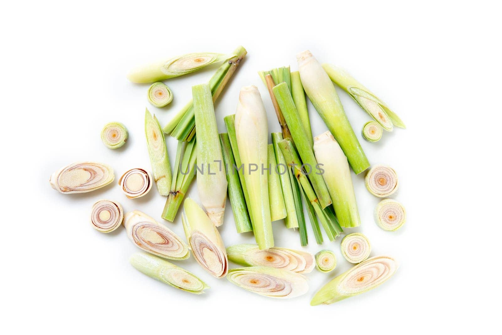 Fresh green lemongrass slices isolated on white background.