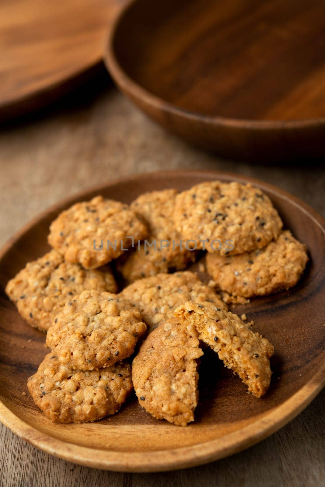 Vegan oatmeal chiaseeds cookies on plate with natural light.