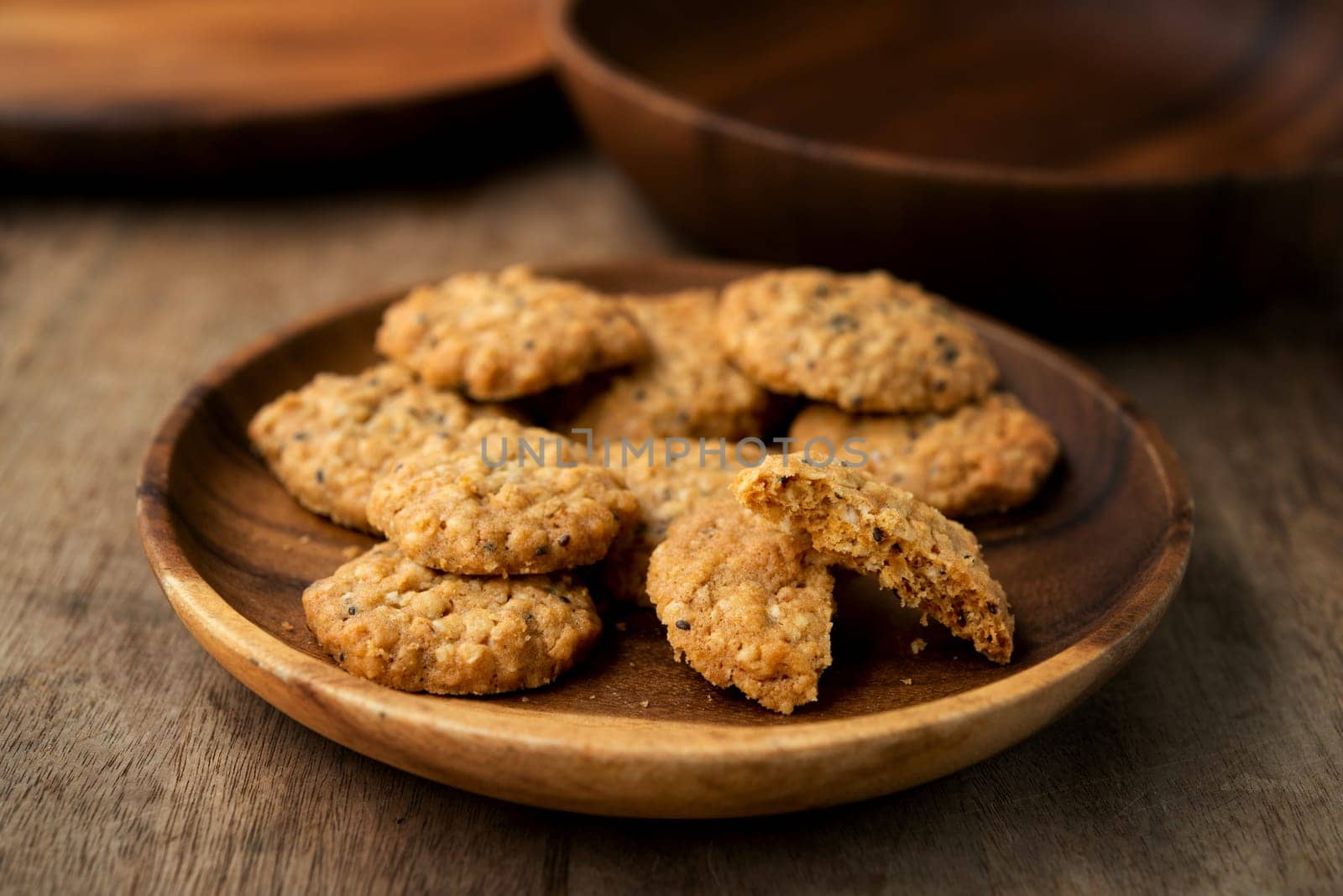 Vegan oatmeal chiaseeds cookies on plate with natural light.