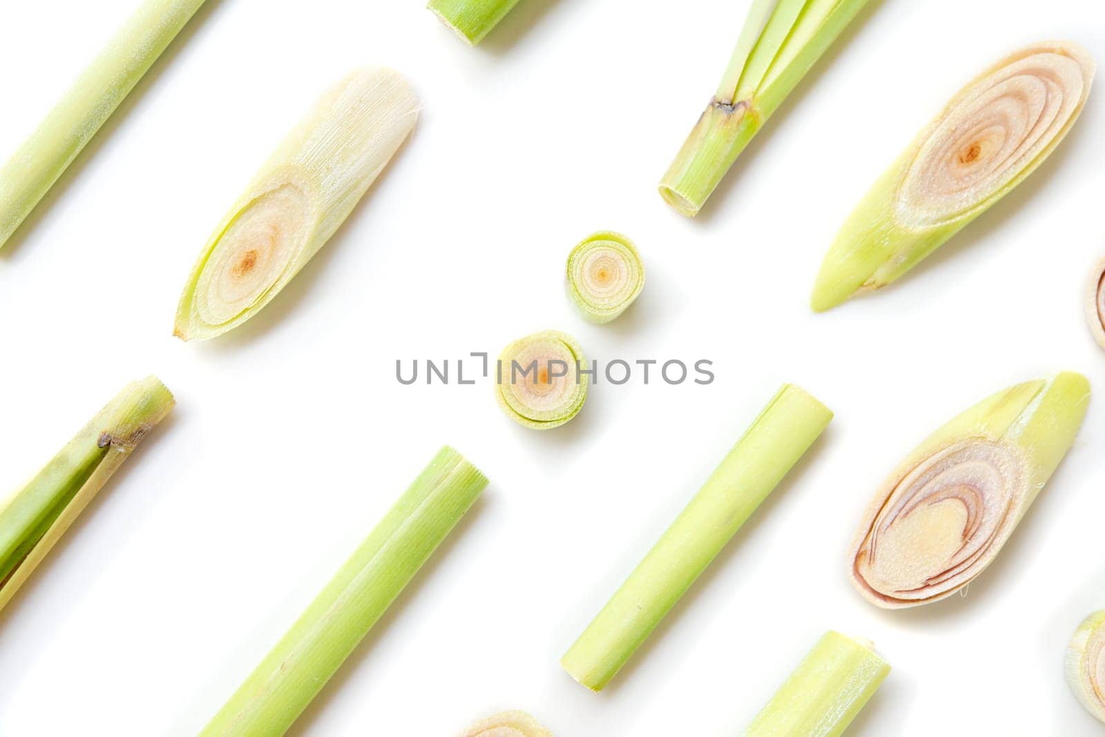 Fresh green lemongrass slices isolated on white background.