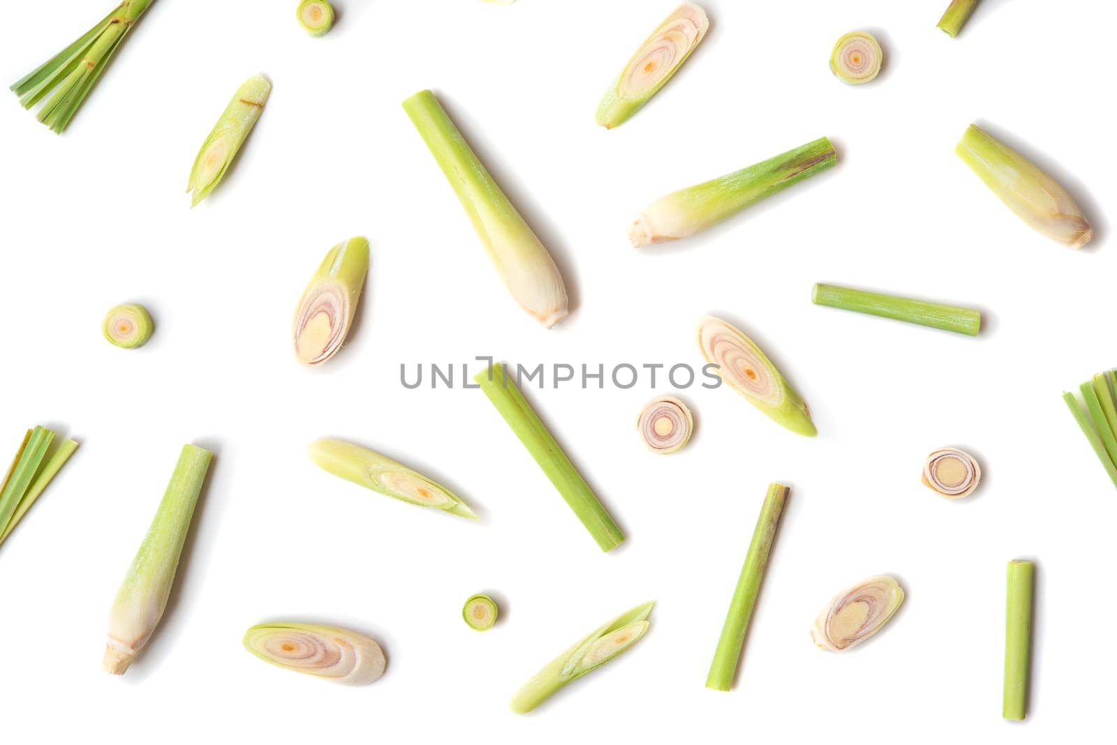 Fresh green lemongrass slices isolated on white background.