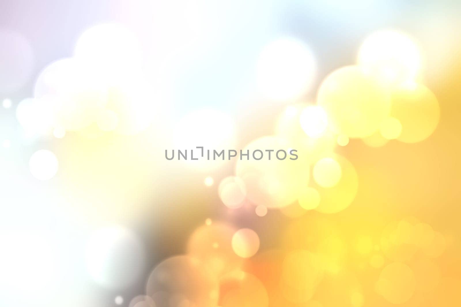 Colorful abstract cloudy pastel colored soft bokeh background. Gradient from gold yellow to white. Space for text.