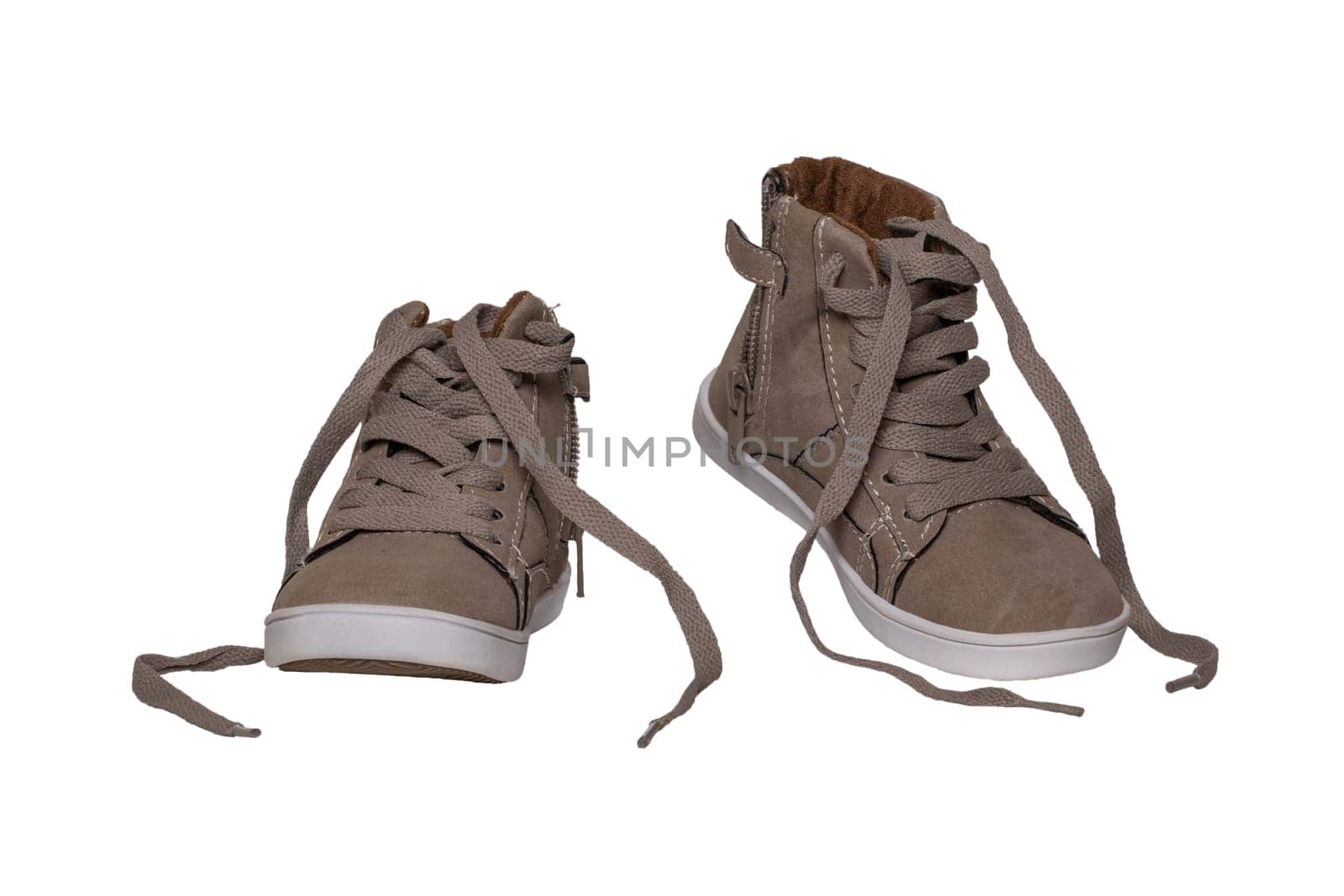 Winter boots and shoes. A pair brown suede winter boots isolated on a white background. Leather shoe fashion new collection winter 2018 to 2019.