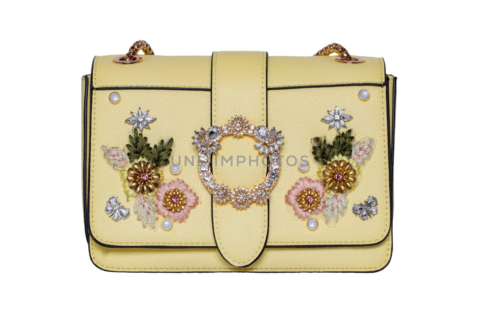 Fashionable yellow female luxury women bag isolated on a white background. Fashionable womans accessories.