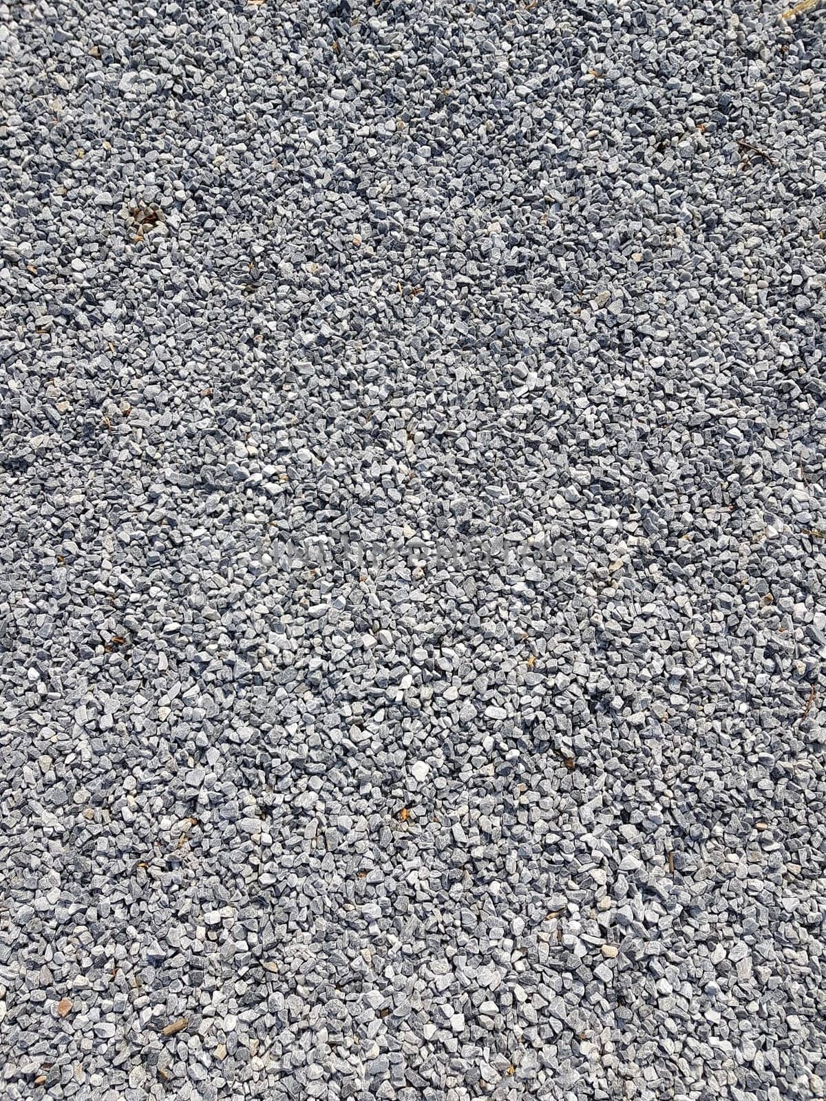 Close-up of a picture with gravel stones, pebbles as a background