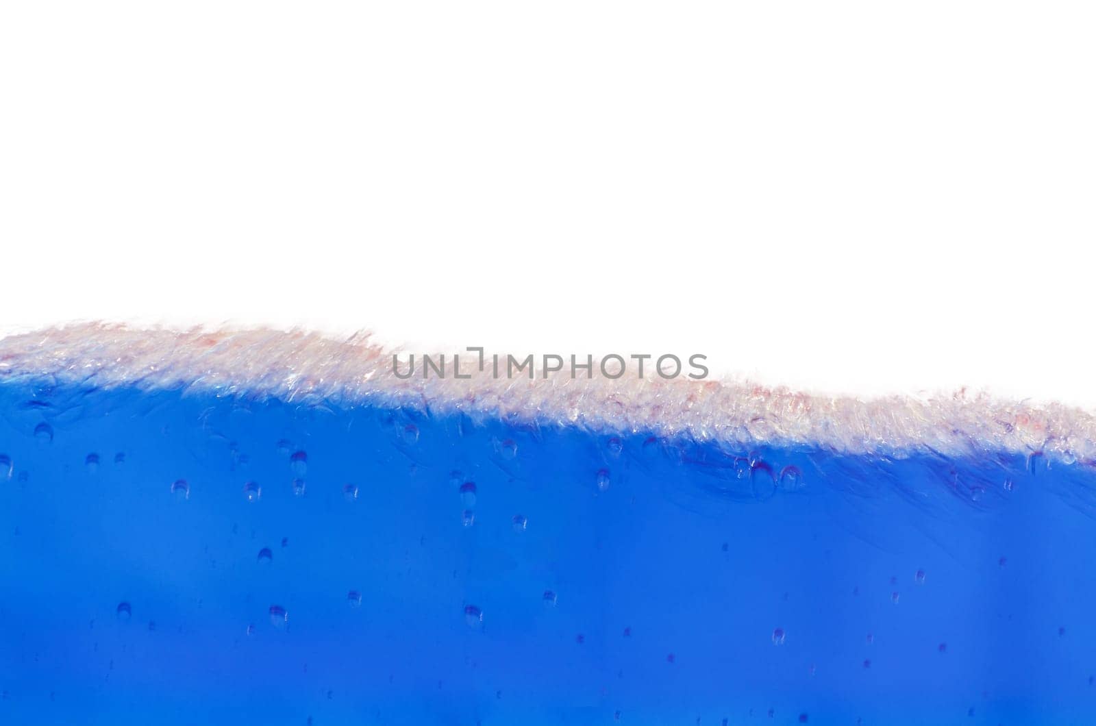 Closeup of a blue liquid, water, background image.