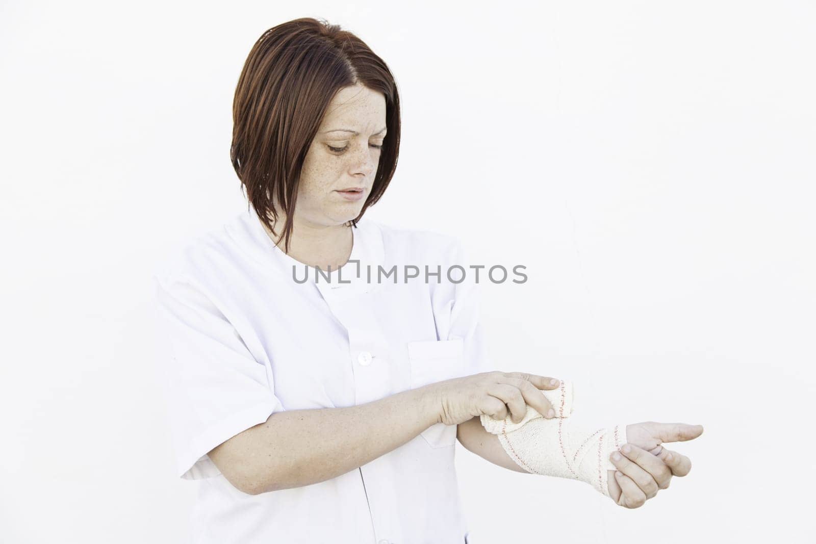 Girl bandaged arm in medical clinic, fracture