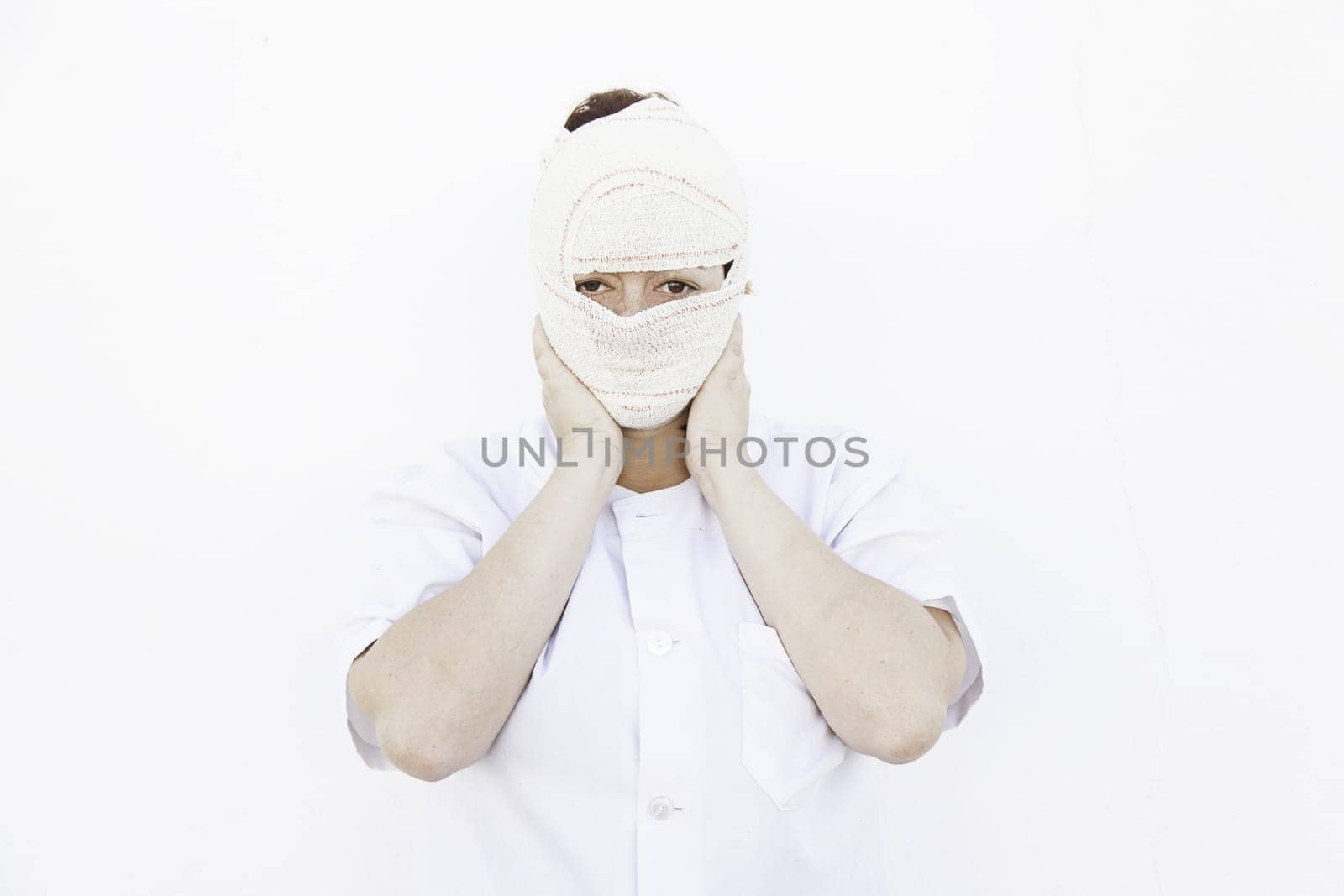 Girl with sad eyes bandaged nurse, medical