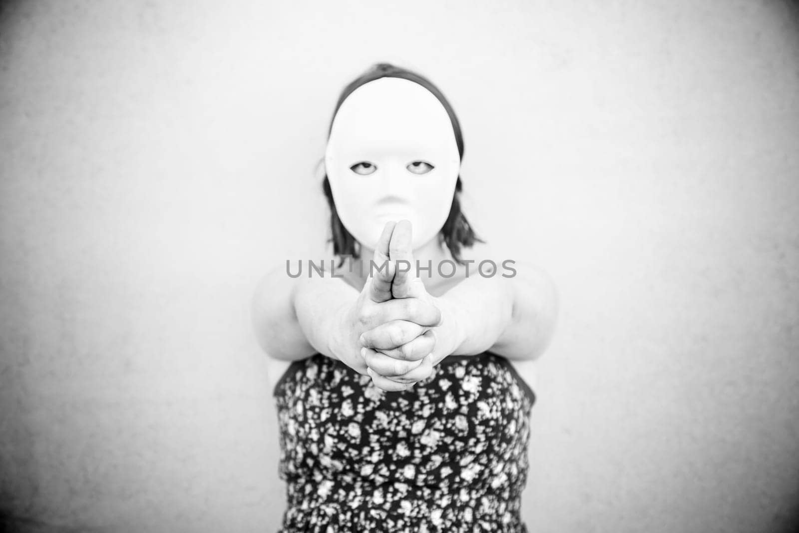 Girl in white mask on halloween, mystery