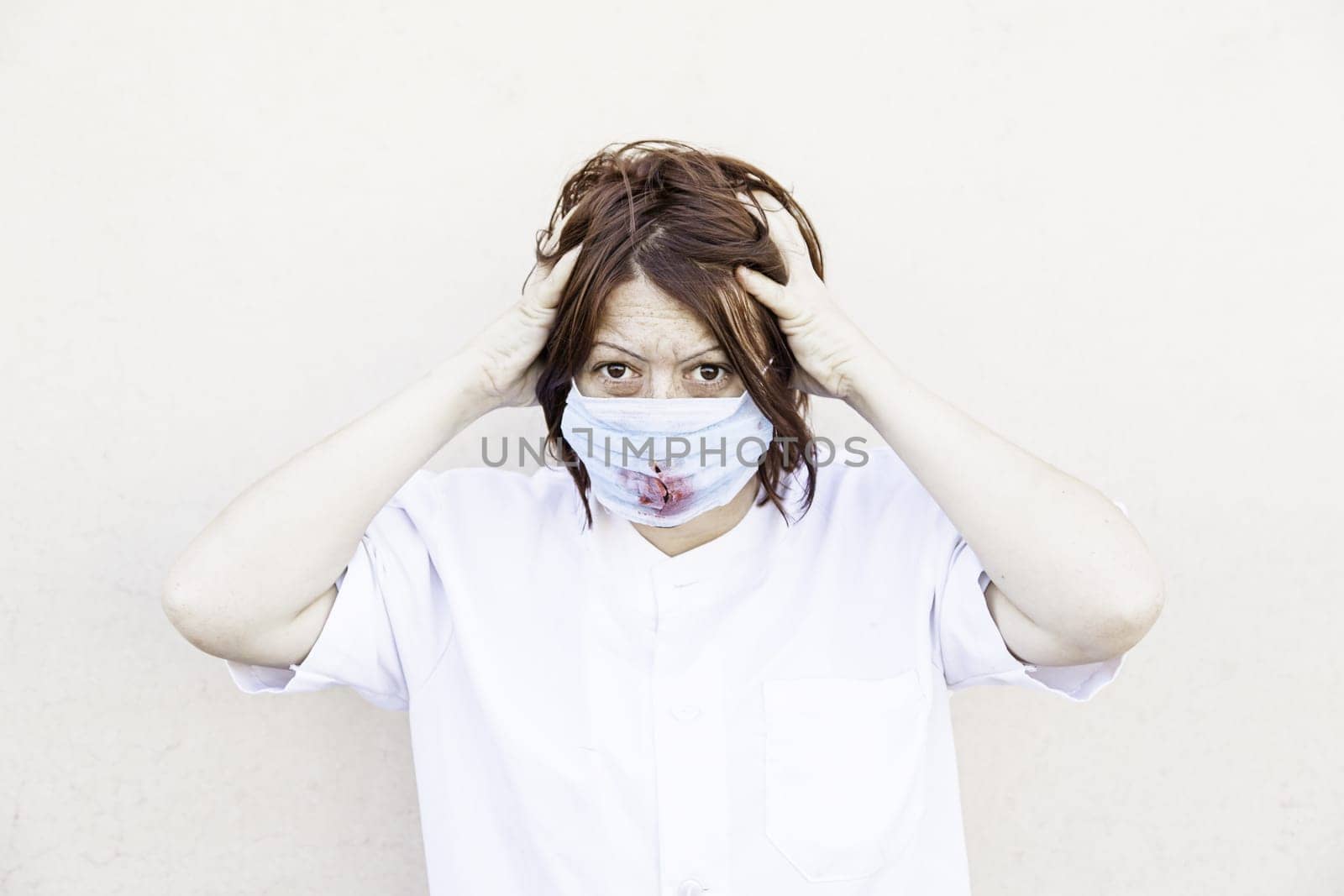 Crazy nurse with bloody mask, halloween