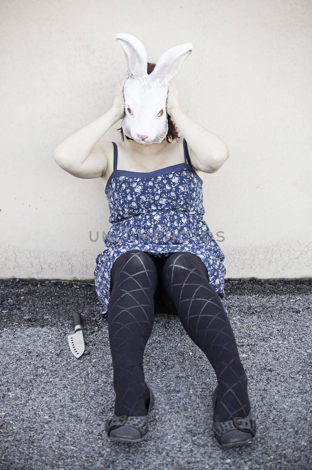 Girl in halloween rabbit mask, fear and terror