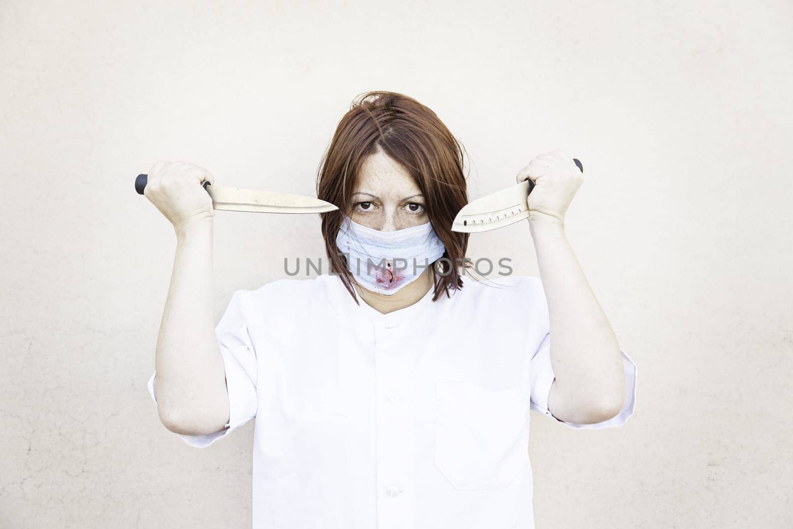 Nurse with knives and bloody mask, halloween