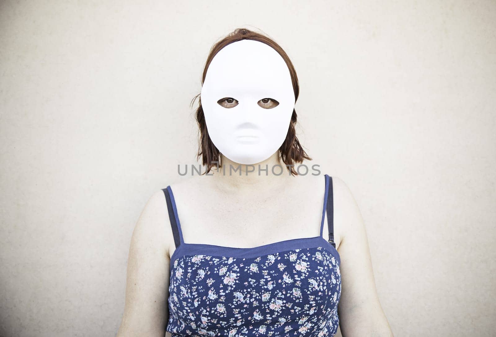 Girl in white mask on halloween, mystery