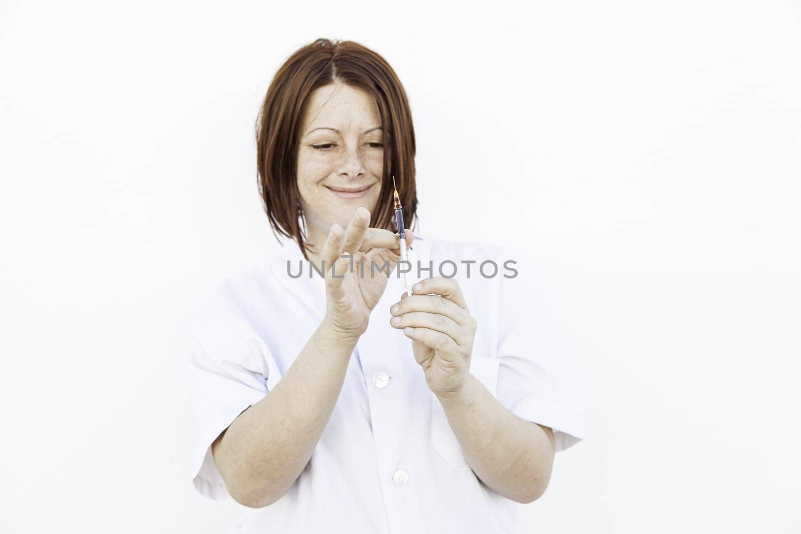 Nurse with needle to prick, medicine and health