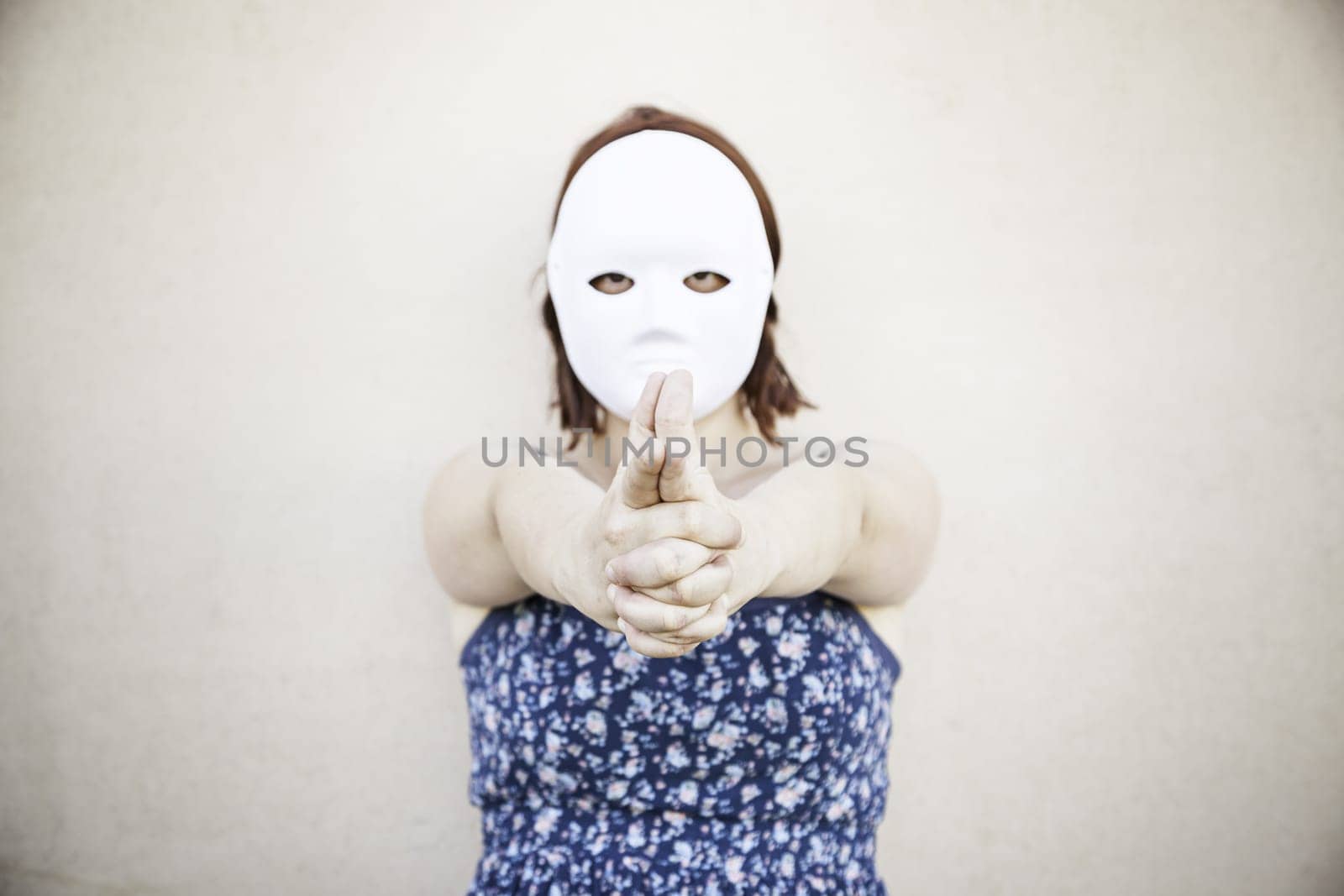 Girl in white mask on halloween, mystery