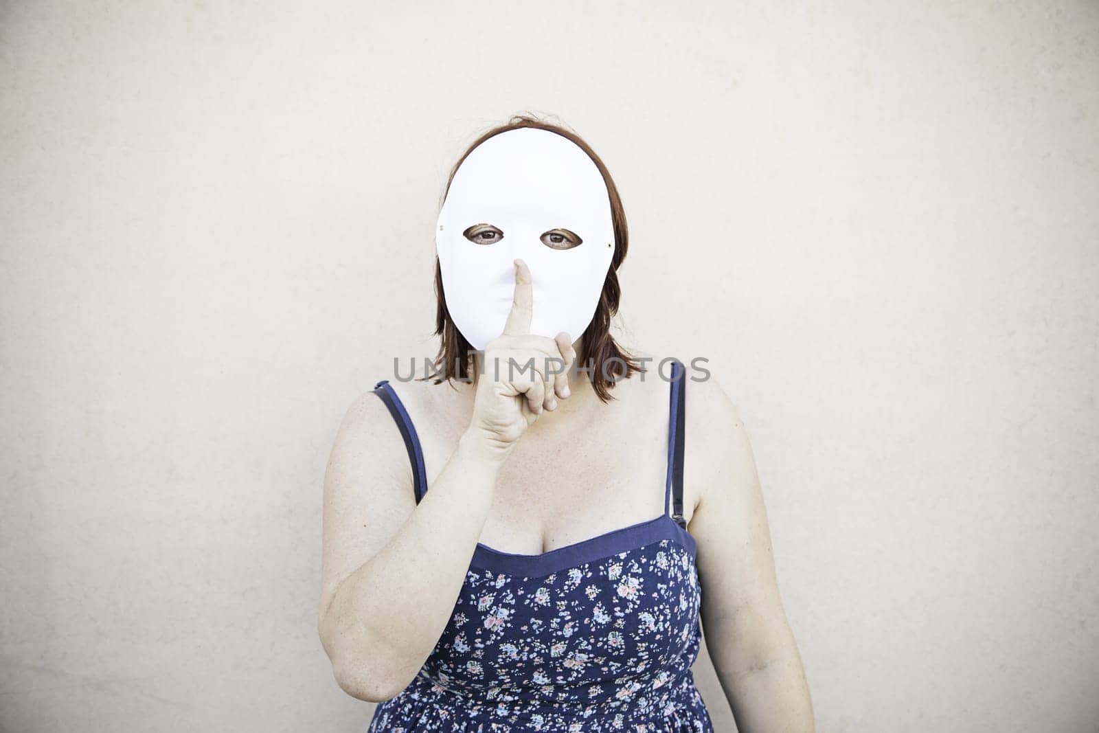 Girl in white mask on halloween, mystery