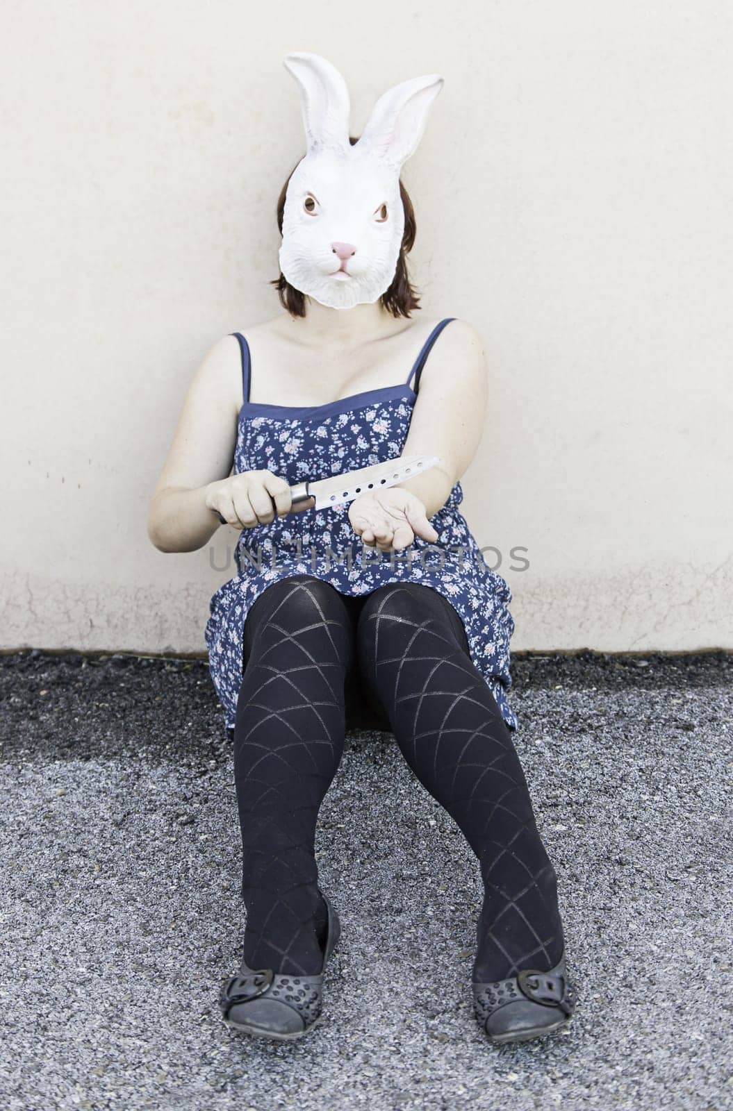 Girl in halloween rabbit mask, fear and terror