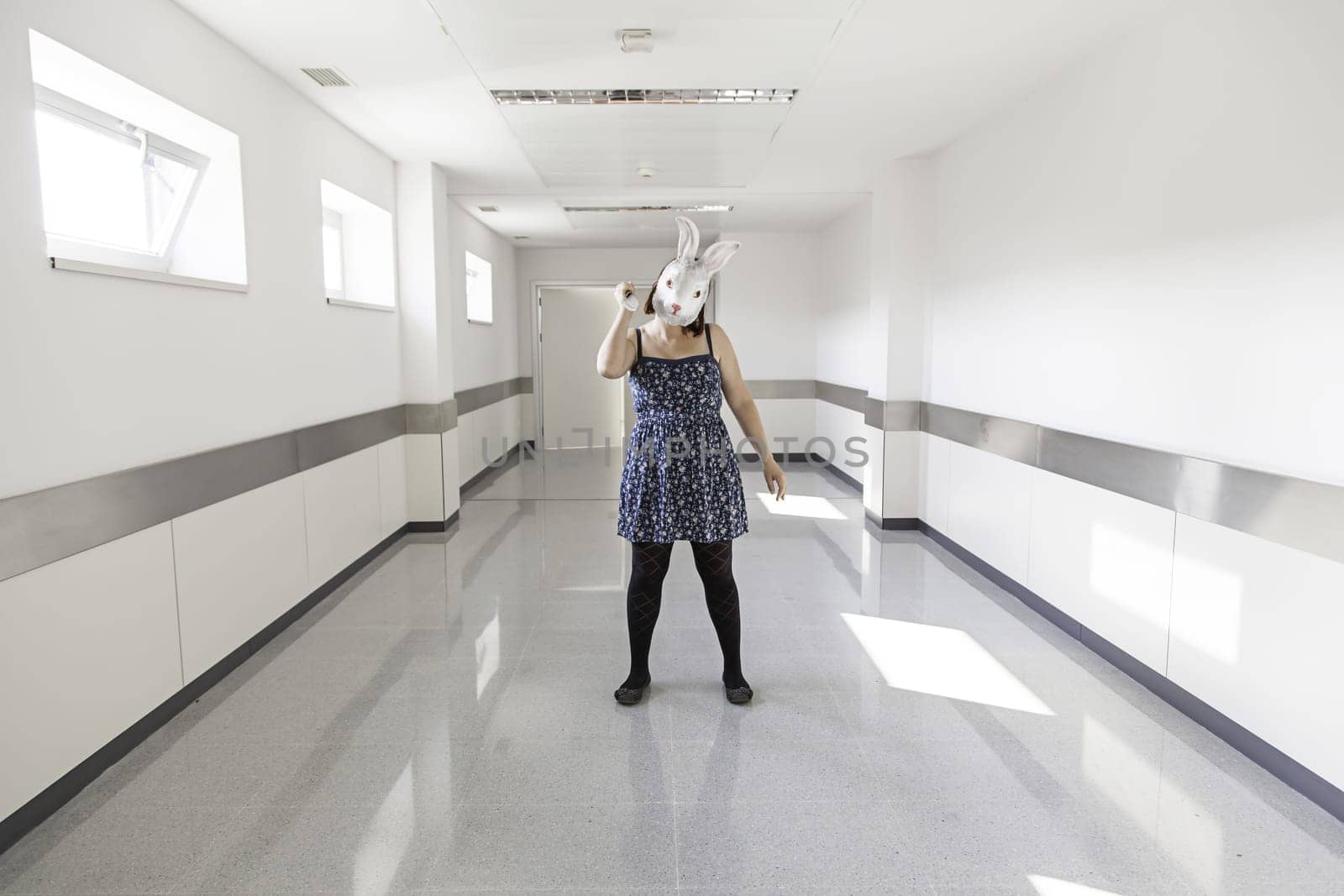 Girl in halloween rabbit mask, fear and terror