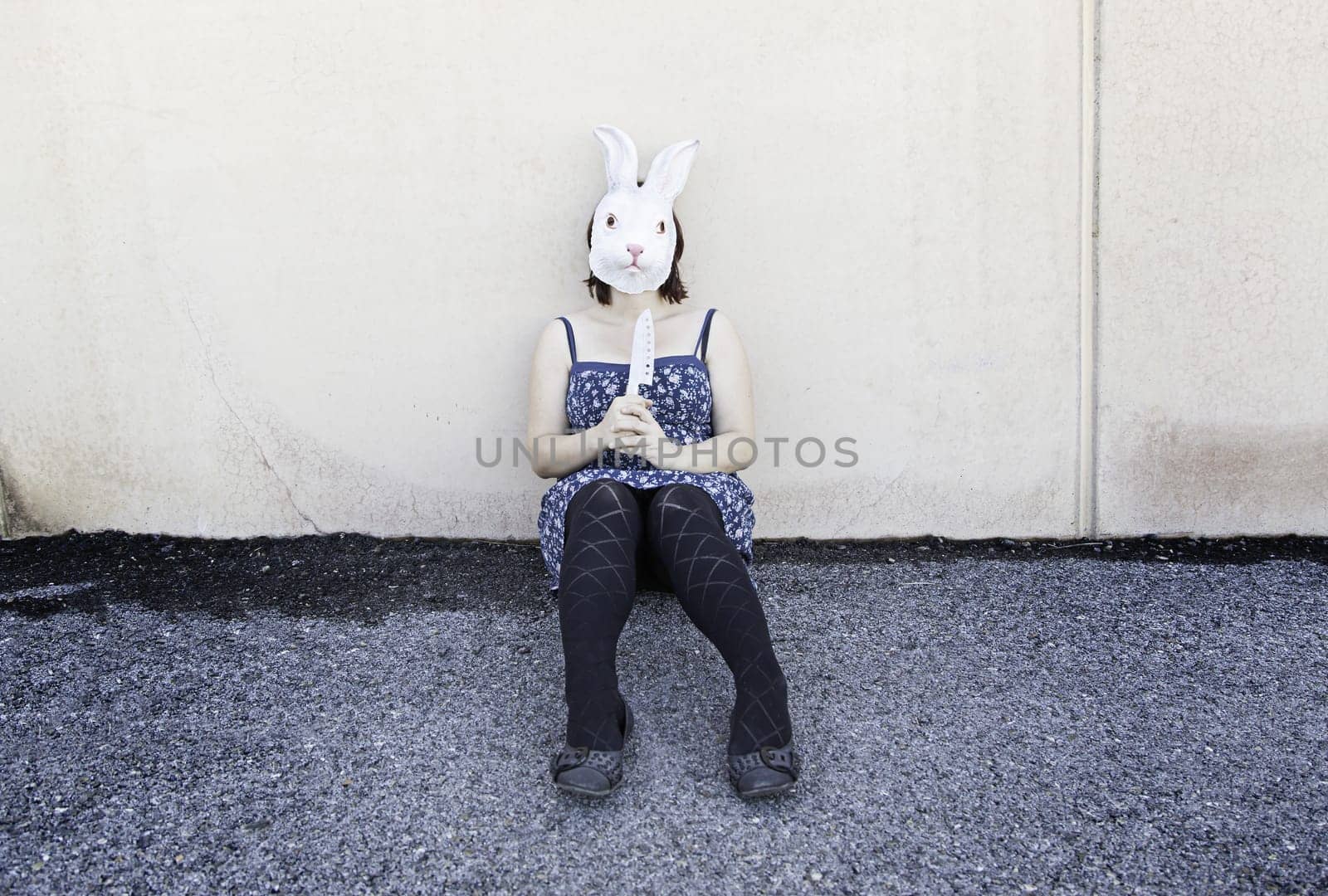 Girl in halloween rabbit mask, fear and terror