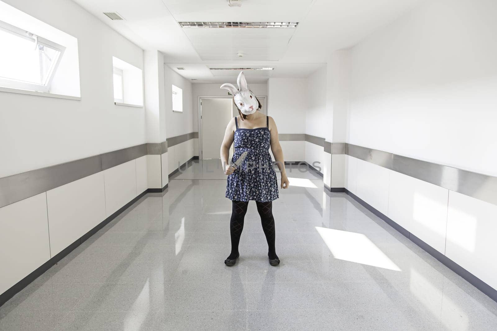 Girl in halloween rabbit mask, fear and terror
