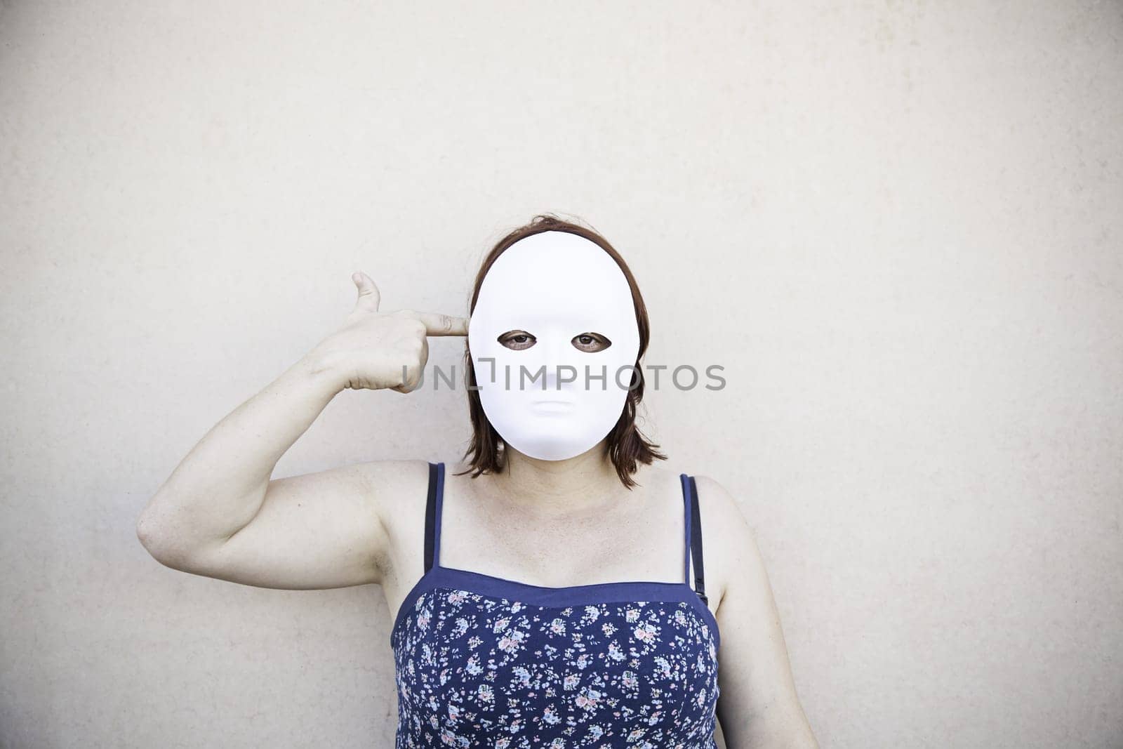 Girl in white mask on halloween, mystery
