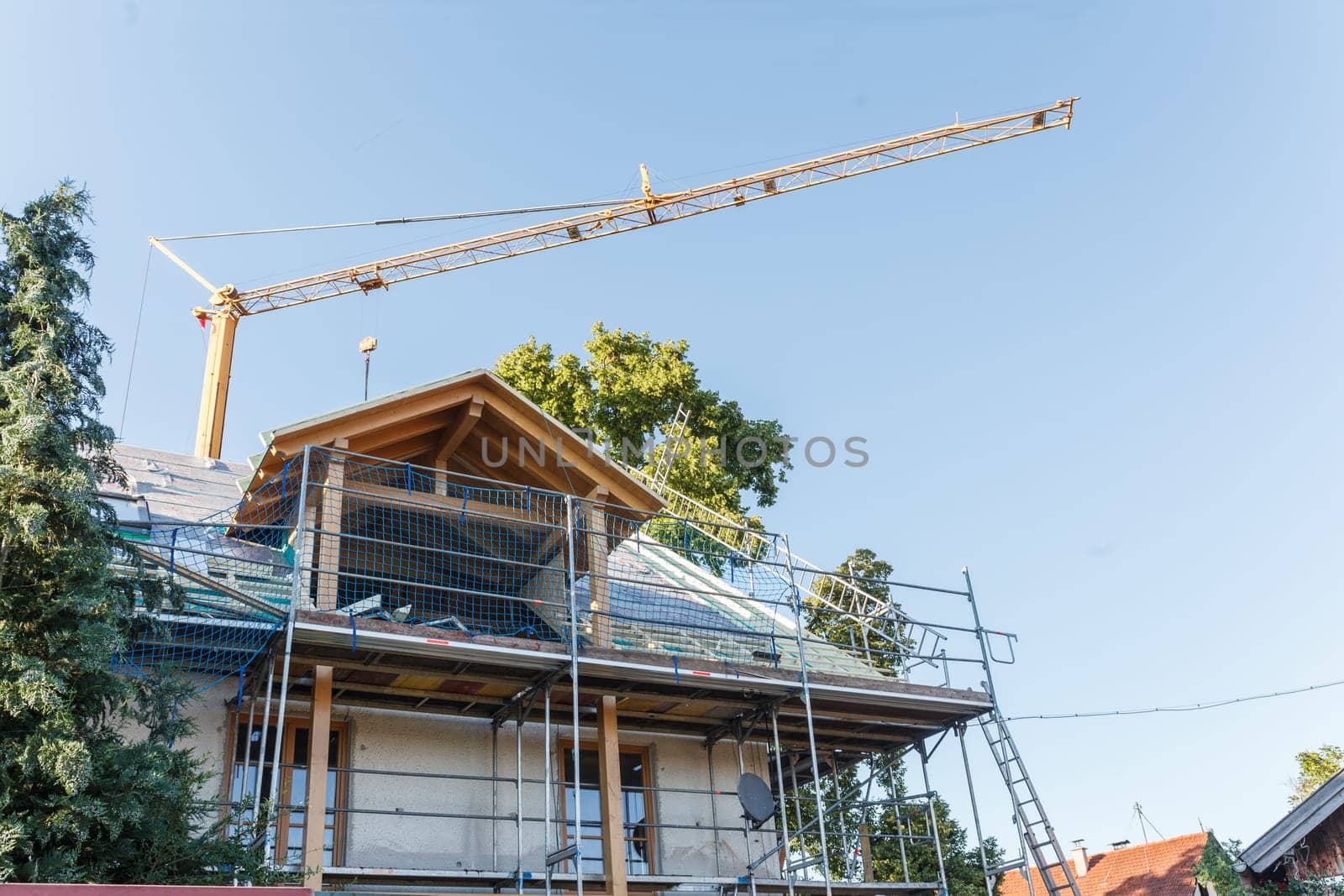 Loft conversion, renovation, renovation and dismantled windows on a construction site.
