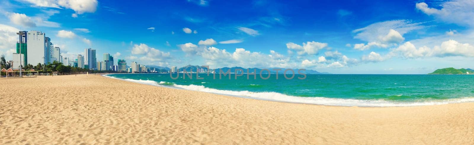 Scenic view of Nha Trang beach at sunny day. Beautiful tropical landscape. Panorama