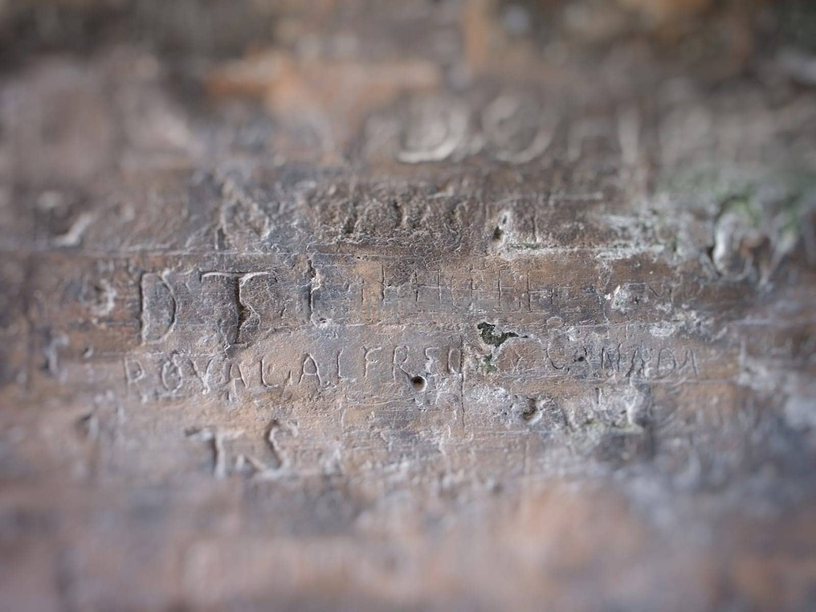 Engraved writings on stone wall