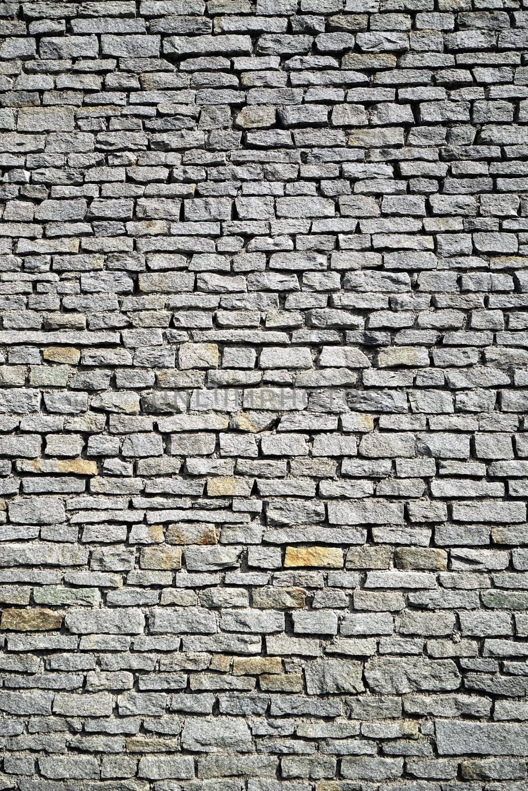 Gray stone wall from an old house