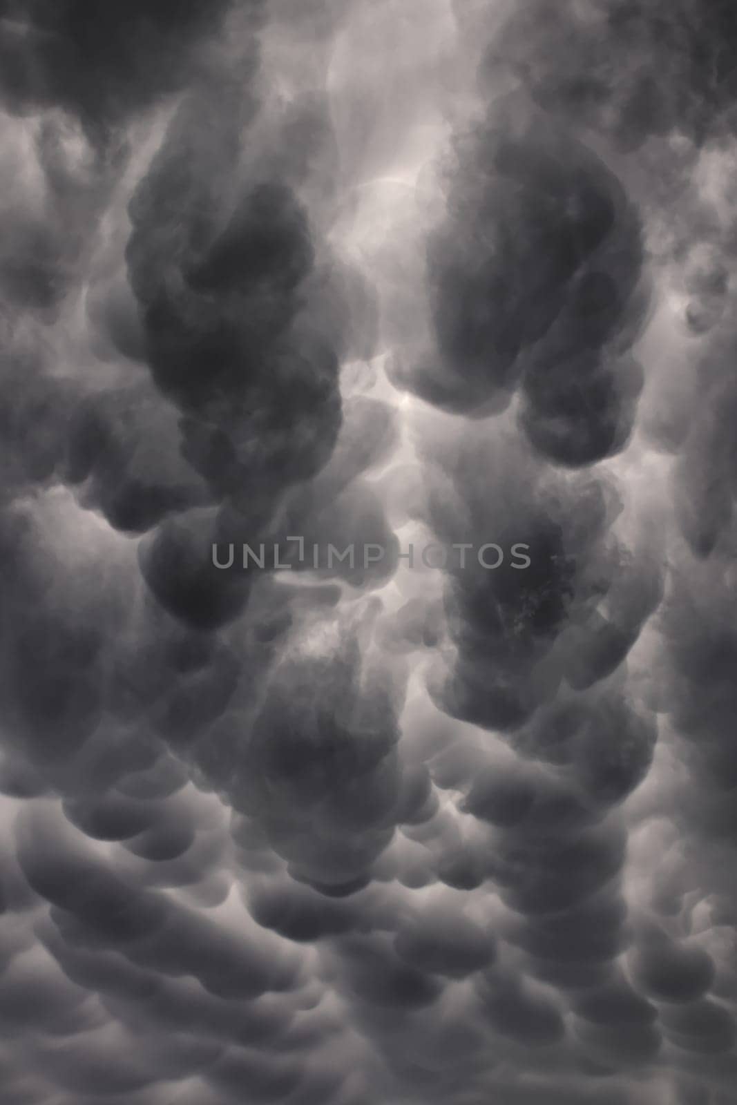 An image of dark, storm, mammatus clouds