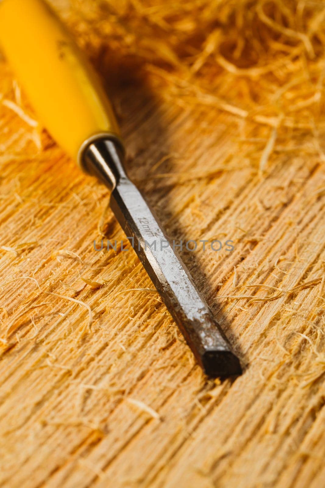 wood chips and cutters lie on a wooden board.