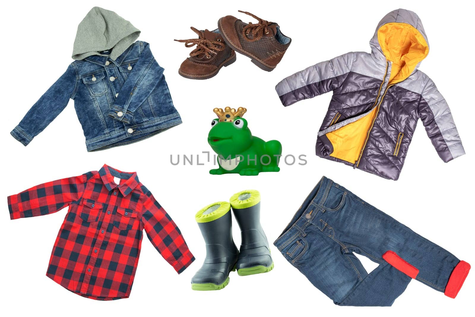 Collage set of children clothes. Denim jacket and pants, shoes and rain jacket for child boy isolated on a white background. Concept spring autumn and summer clothes. Clos-up.